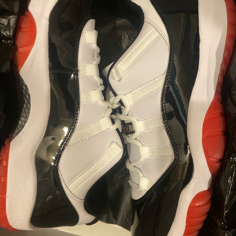 Air Jordan 11 Retro Low Black and Red Sneakers